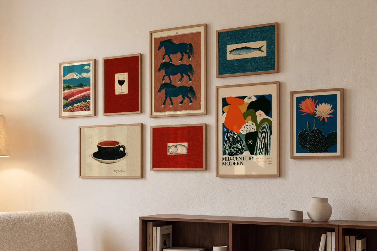A salon hang of eight Haze & Juniper prints, including Fuji Flower Fields, Espresso Cup, Wine Glass and Three Horses Scroll