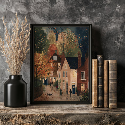 a framed painting of a quaint village scene, with a cobblestone street, colorful houses, and people walking along the street. The painting is displayed on a wooden shelf, accompanied by a black vase with dried flowers and a stack of books.
