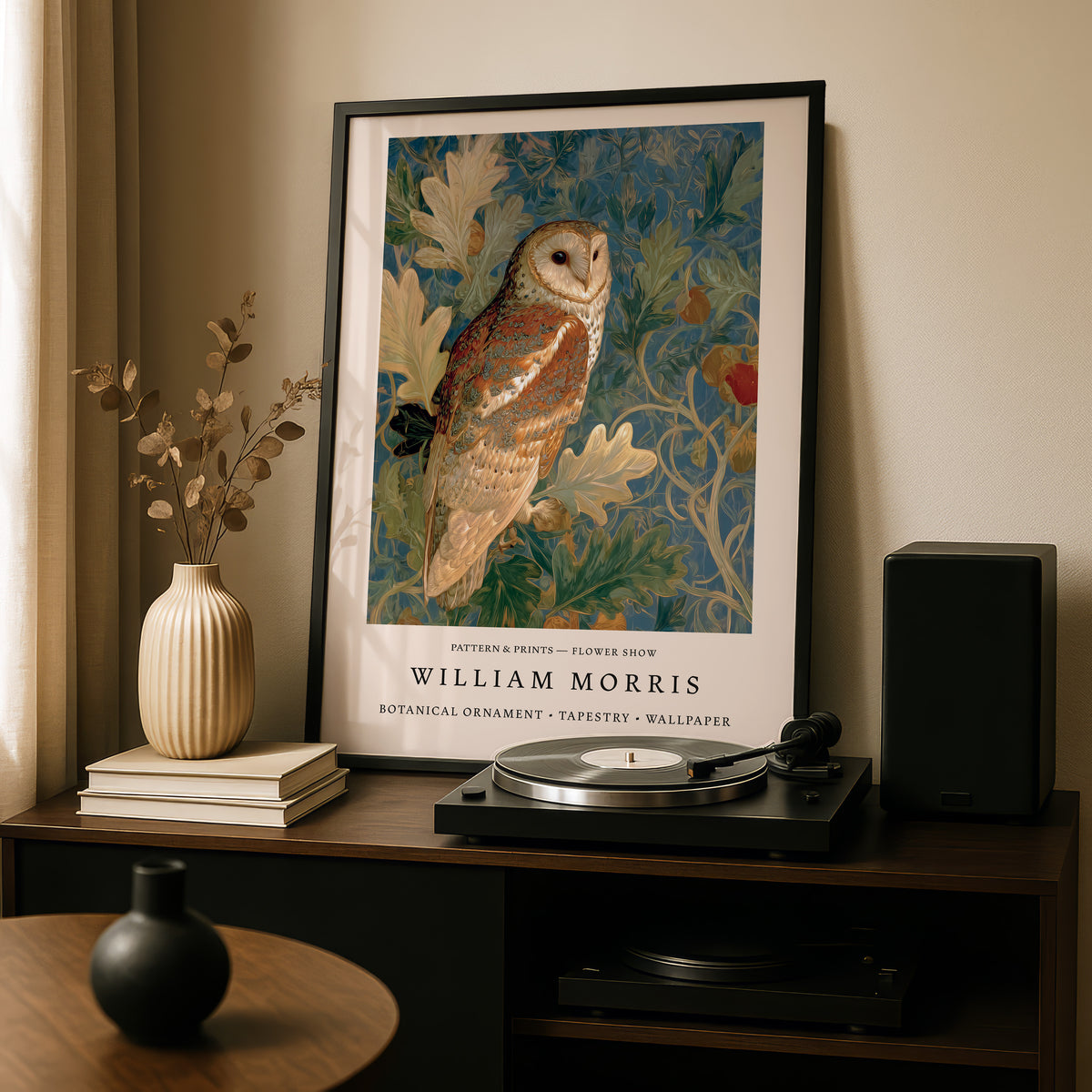 a framed painting of a brown owl perched on a branch, displayed on a wooden shelf above a record player and other decorative items.