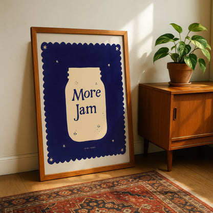 a framed poster with a jar design and the text "More Jam" on a wooden cabinet next to a potted plant.
