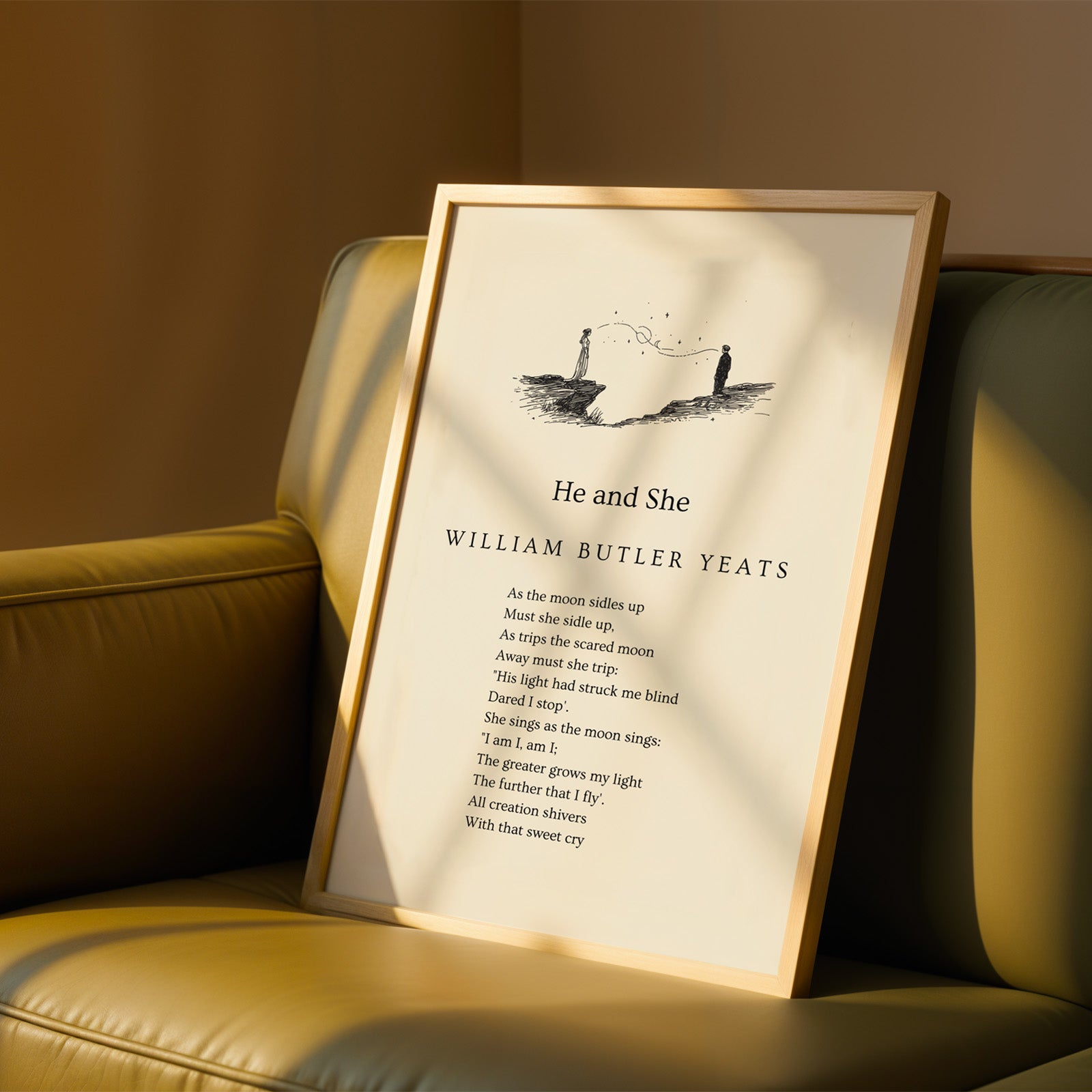 a framed poem titled "He and She" by William Butler Yeats, resting on a brown leather couch.
