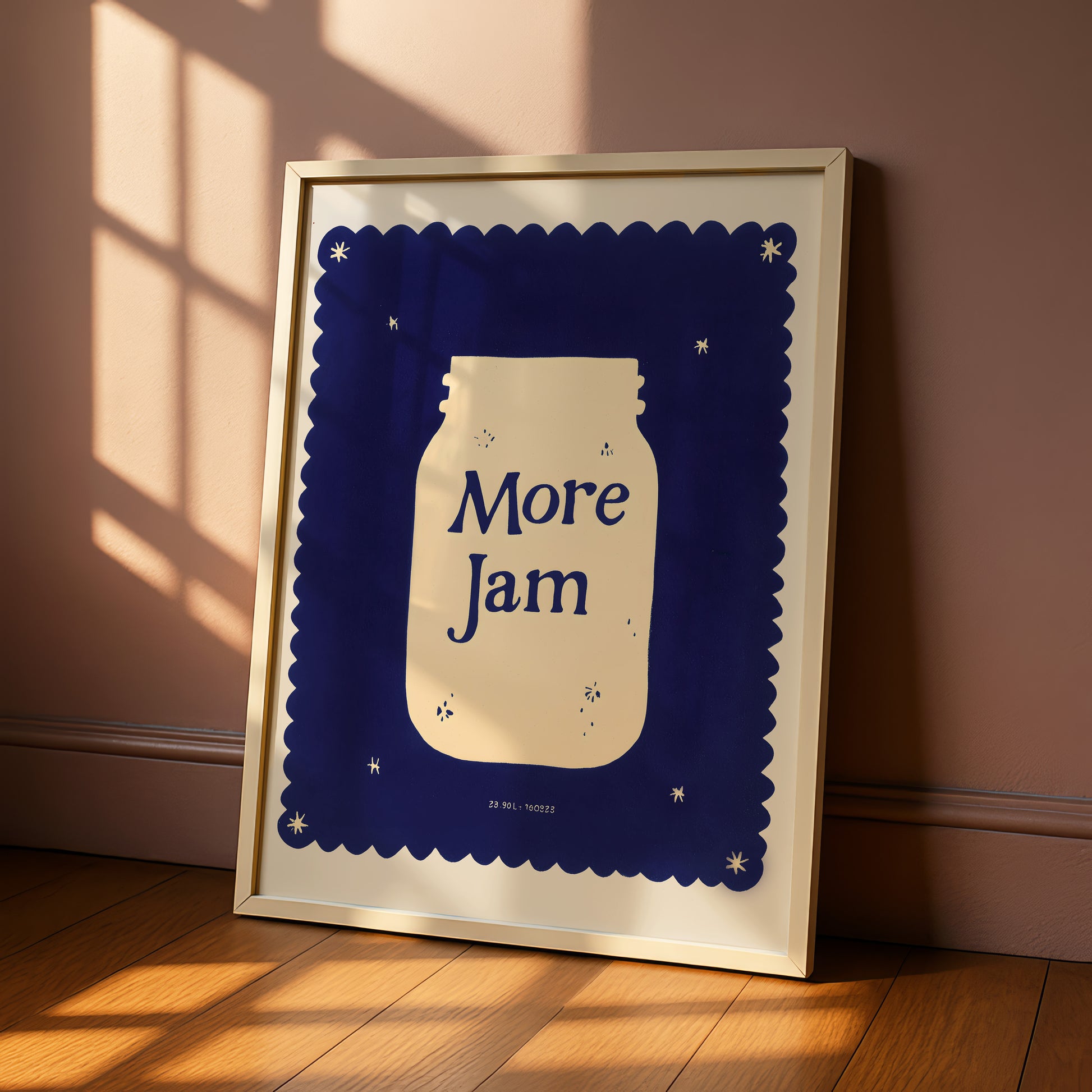 A framed poster with a blue background and a white jar illustration, displaying the text "More Jam" in a bold font.
