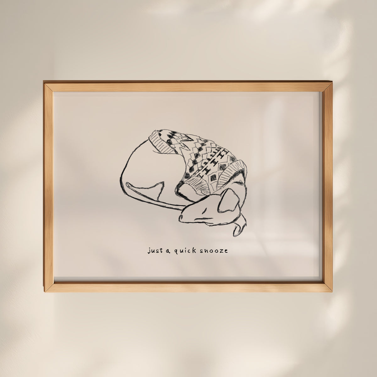 Sleeping Whippet in Sweater Print, pencil sketch of a whippet curled up asleep in a jumper