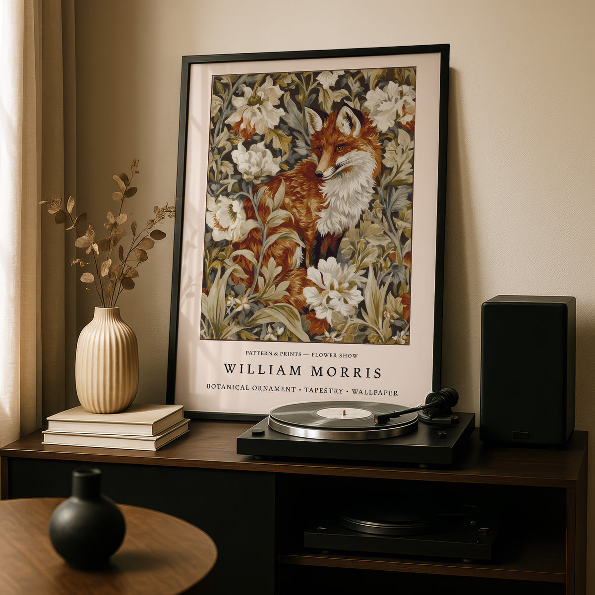 a framed poster of a fox surrounded by a floral pattern, placed on a wooden shelf above a record player and other decorative items.