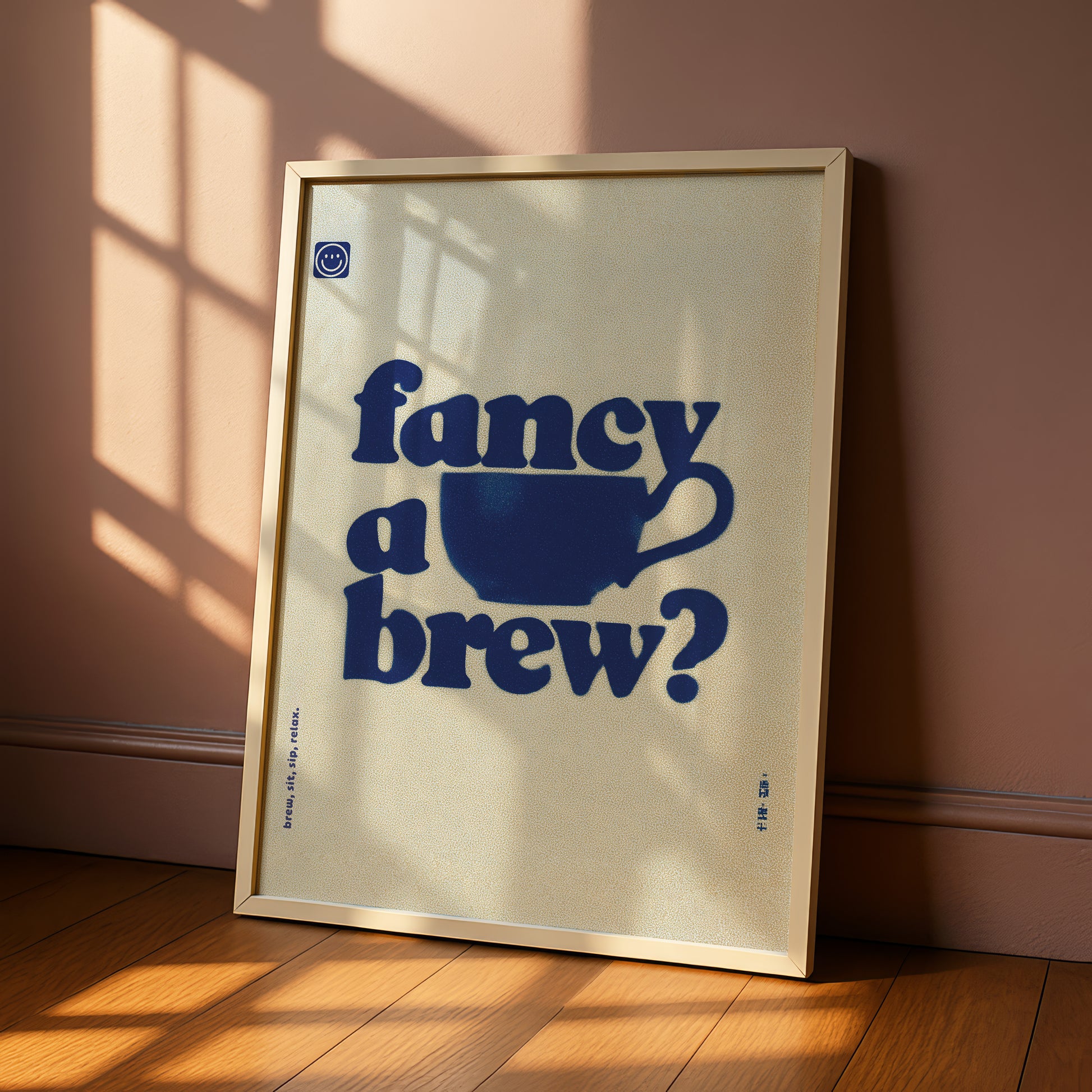 A framed poster with the text "fancy a brew?" displayed prominently on it.