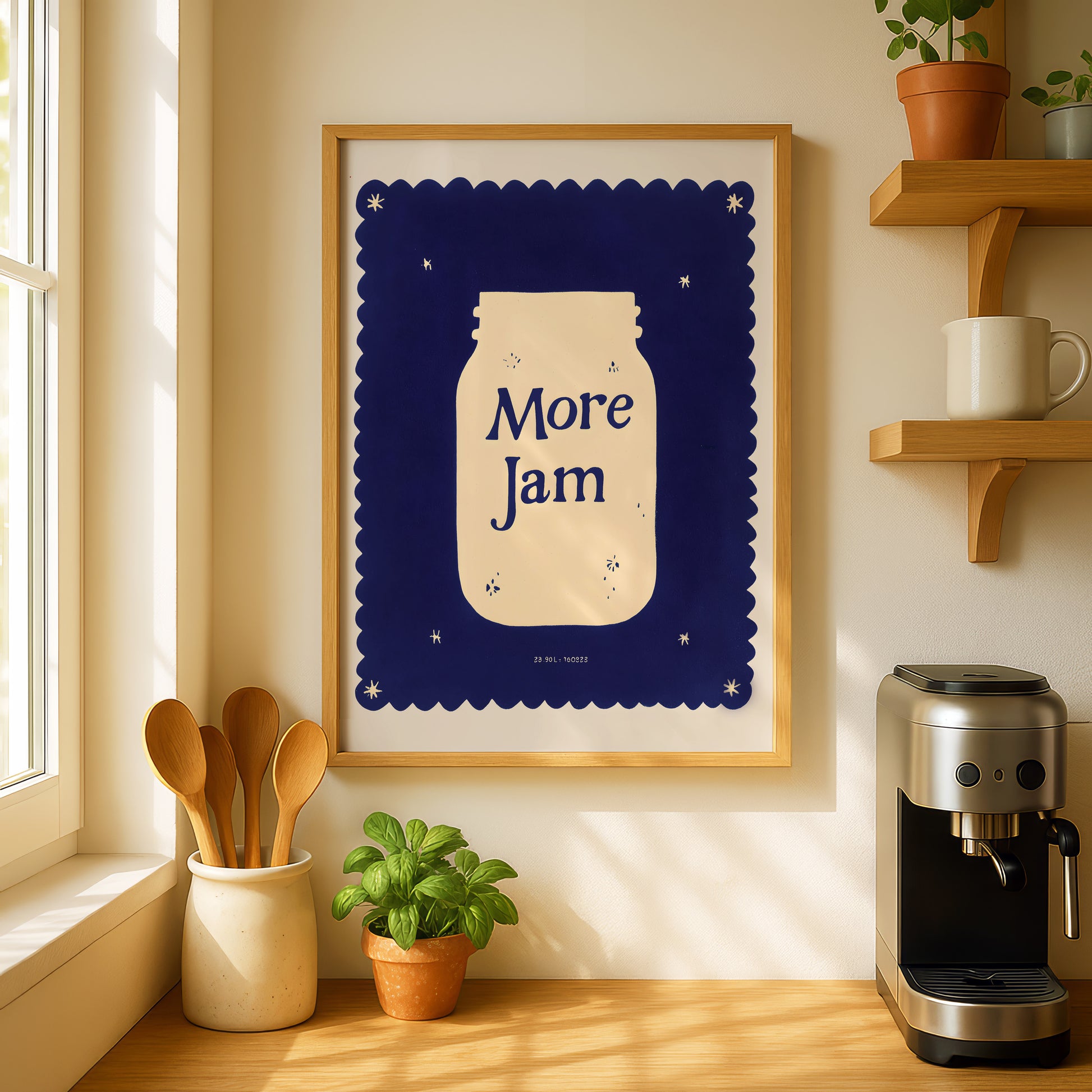 a kitchen counter with a framed poster of a jar of jam, wooden spoons, a potted plant, and a coffee maker.