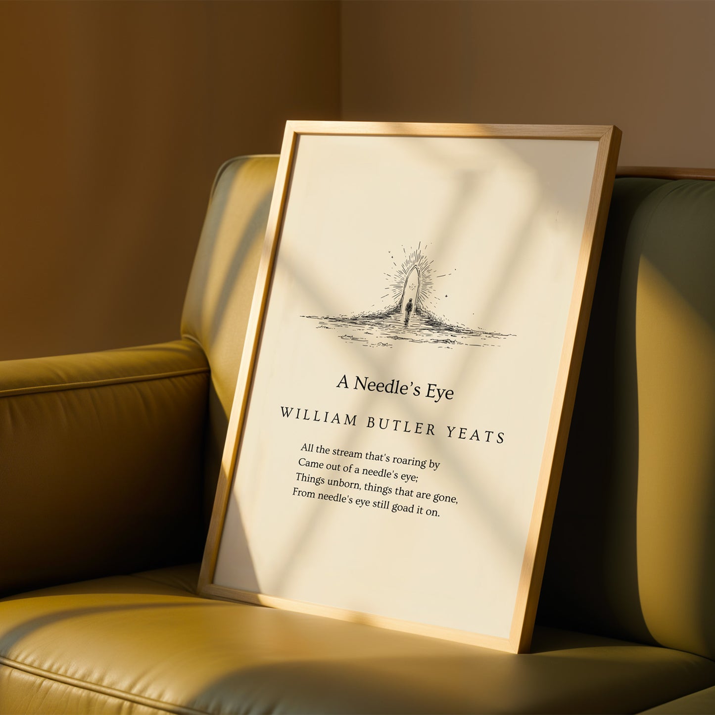 A framed poster of William Butler Yeats' poem "A Needle's Eye" is displayed on a brown leather couch, with the title and poem text visible.